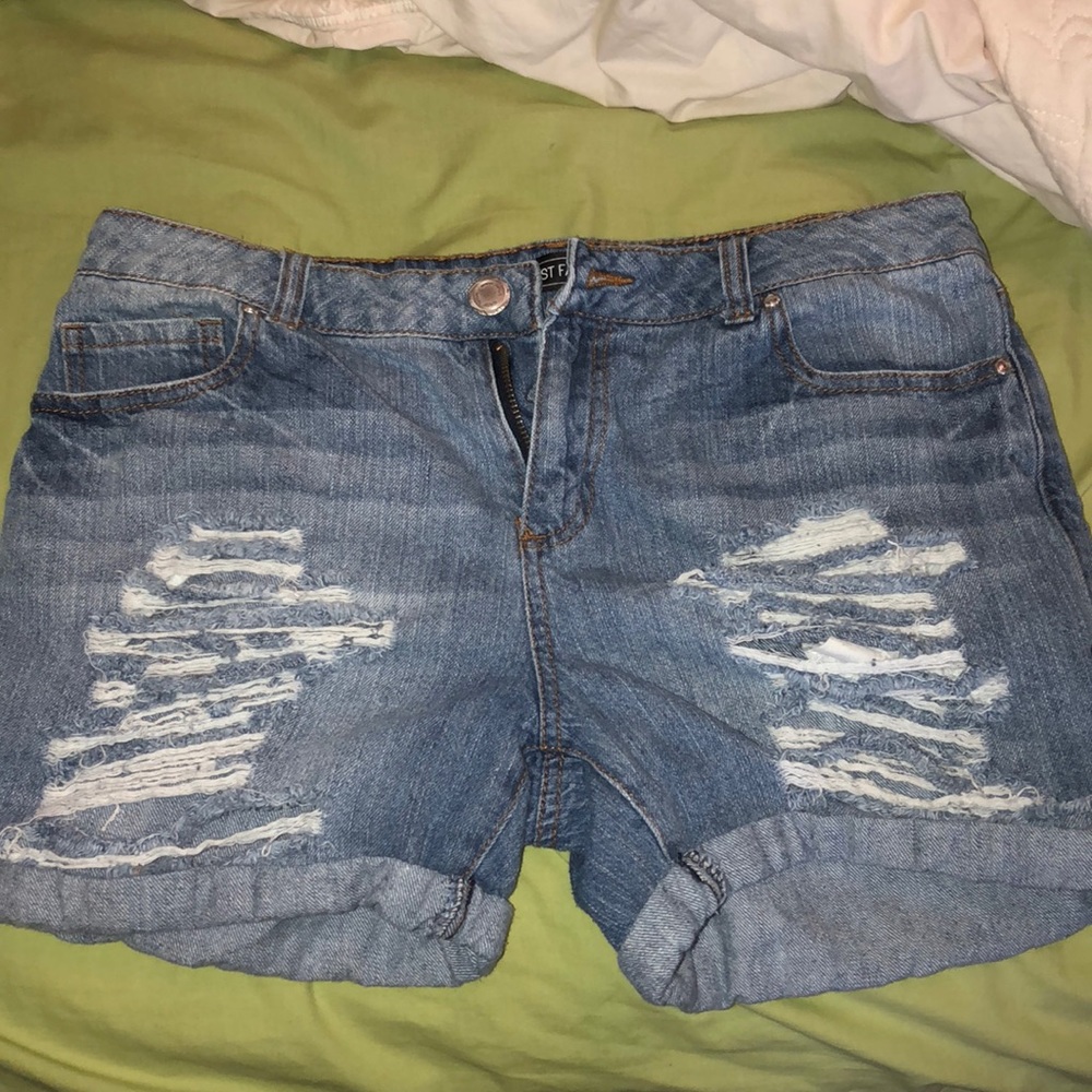Blue jean ripped shorts
